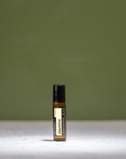 Jasmin Touch dōTERRA, flacon à bille sur fond vert