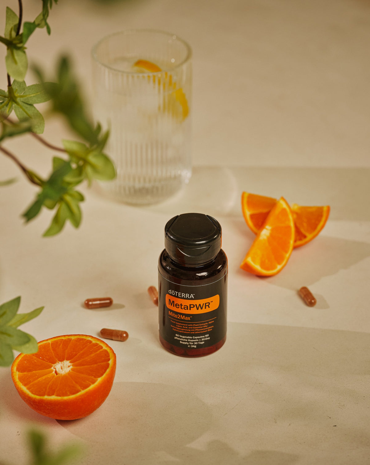 MetaPWR Mito2Max dōTERRA, flacon avec orange et verre