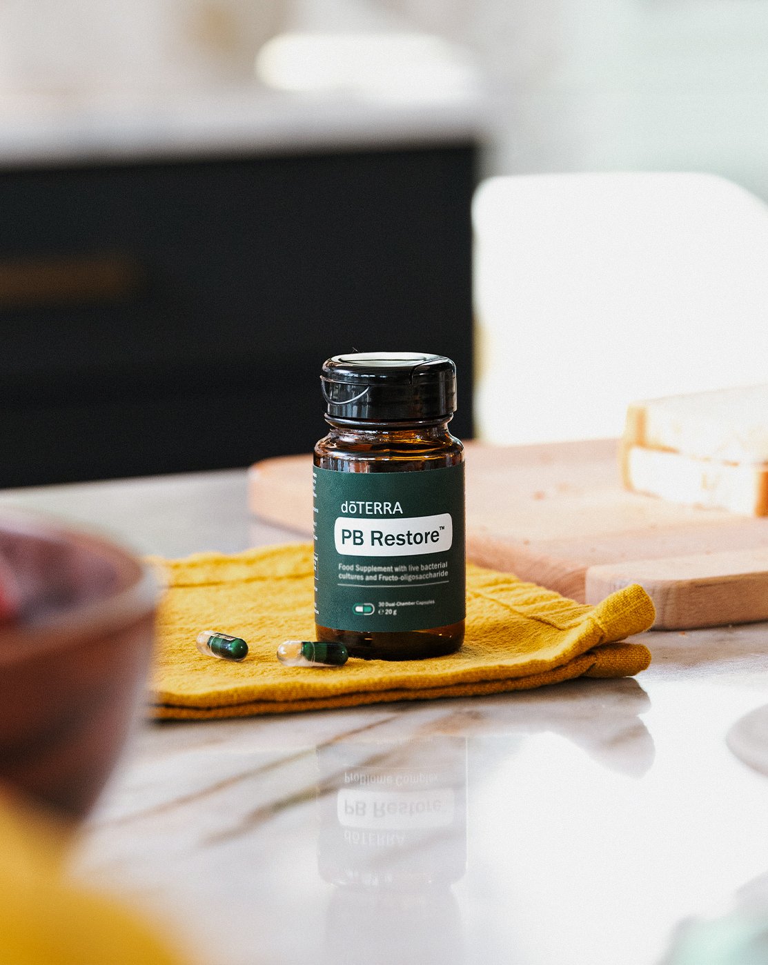 PB Restore dōTERRA, flacon dans une cuisine