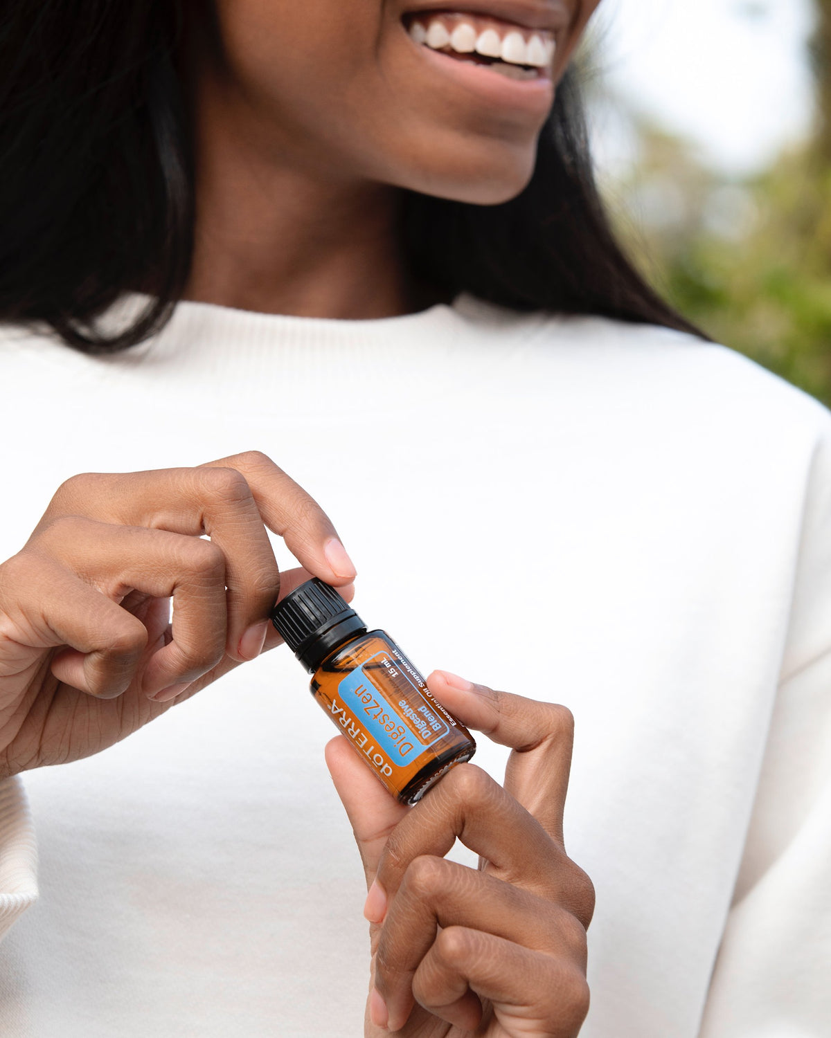 ZenGest mélange d'huiles essentielles dōTERRA, huile appliquée sur le ventre