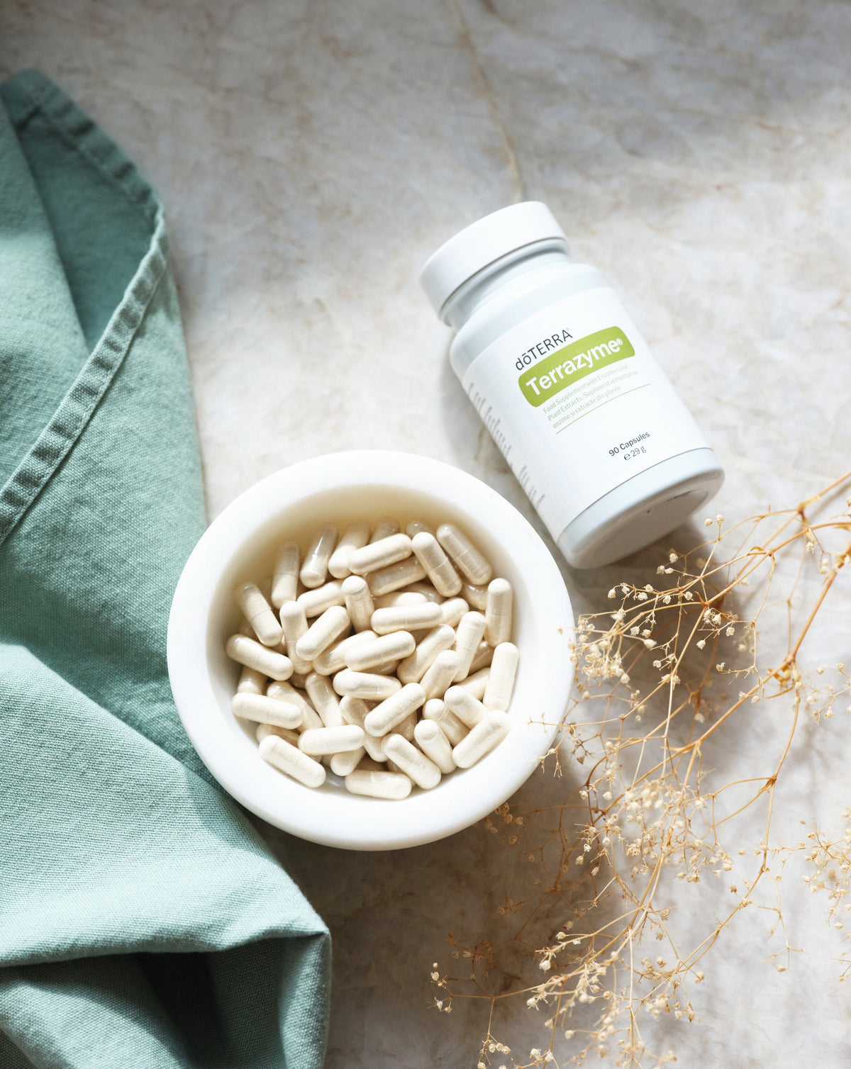 ZenGest TerraZyme dōTERRA, flacon et coupelle de capsules
